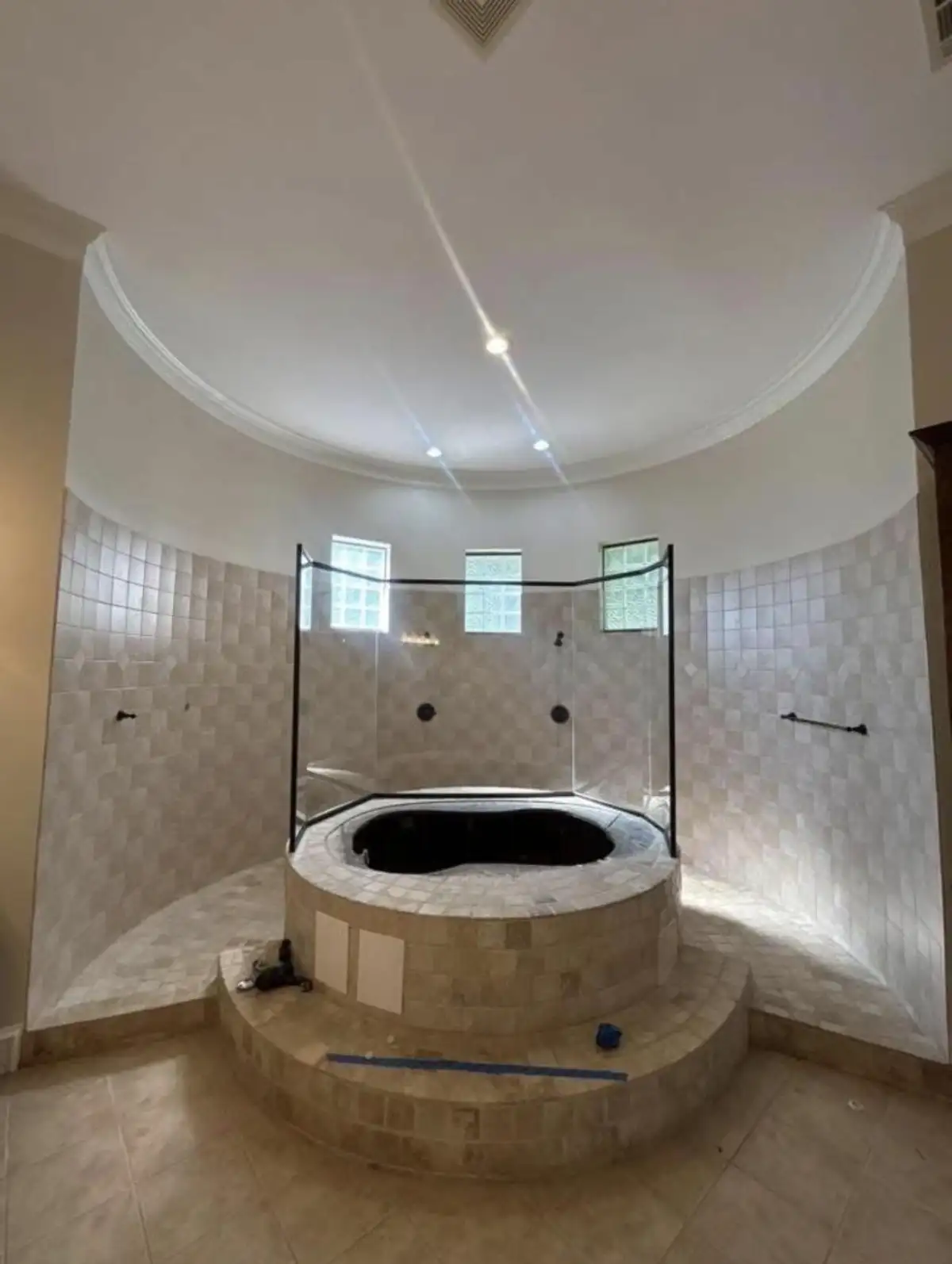 Fort Worth bathroom remodeling with updated tile, freestanding tub, and custom shower finishes